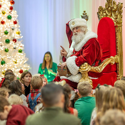 Santa Claus speaking to children